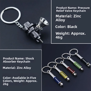Detailed view of zinc alloy turbo and colorful shock absorber keychains with metal springs