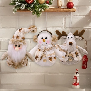 Detailed plush Christmas ornaments featuring gnome, snowman, and deer with knit textures