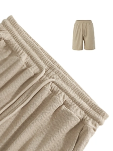 Detail of khaki men's waffle knit shorts with adjustable drawstring elastic waistband