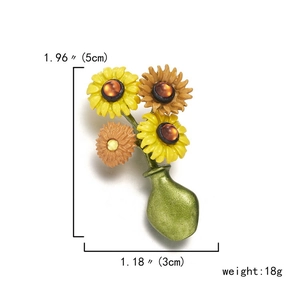 Detail view of sunflower bouquet brooch in green vase with dimensions 5cm by 3cm