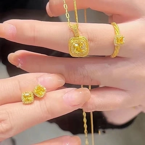 Luxurious yellow crystal jewelry set with necklace, ring and earrings in gold plating