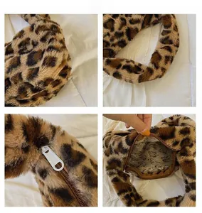 Detailed close-up of plush leopard print faux fur handbag with zipper and inner lining