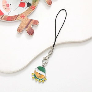 Close-up of Santa charm with green hat and orange face on silver lobster clasp