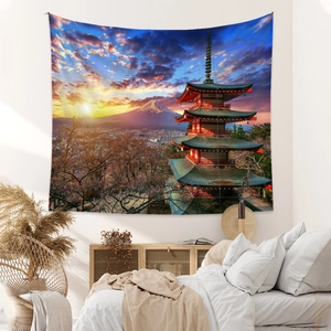 Detail of Mount Fuji tapestry with cherry blossoms and pagoda hanging on a bedroom wall
