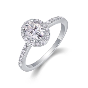 Macro detail of oval moissanite ring in 925 sterling silver with halo accent diamonds