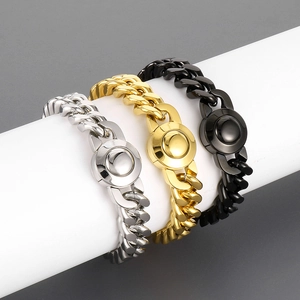 Detailed view of silver, gold, and black 11mm CNC iced out Cuban link chains with clasps