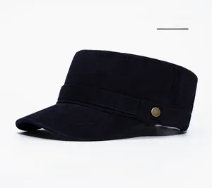 Detail of navy blue cotton army cap showing vintage bronze metal buckle and stitching