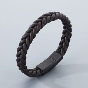 Detail view of woven brown microfiber leather bracelet with black matte magnetic buckle