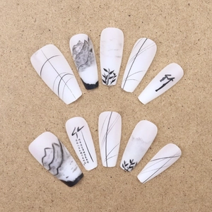 Chinese ink painting style matte press-on nails with bamboo and landscape patterns