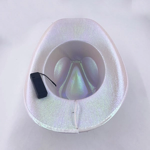 Detail of white iridescent LED cowboy hat showing interior lining and black battery pack