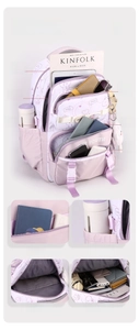 Detail view showing multi-pocket storage layout of the cute lavender school backpack