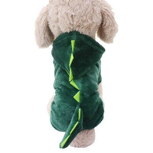 Green plush dinosaur hoodie for pets featuring a soft fleece texture and cute back spikes