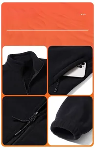 Detail view of black fleece jacket with standing collar, zipper pockets and elastic cuffs
