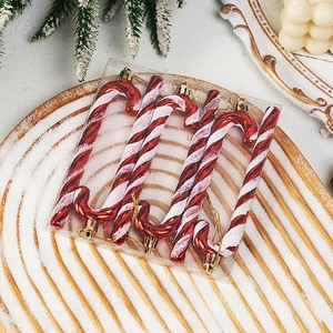Detail of 6-piece red and white striped candy cane Christmas tree ornaments in box
