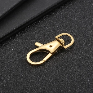 Detailed view of a gold-plated stainless steel swivel lobster clasp for jewelry making