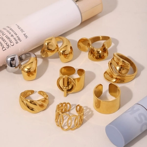 Set of 8 minimalist 18K gold plated stainless steel rings in various modern organic shapes