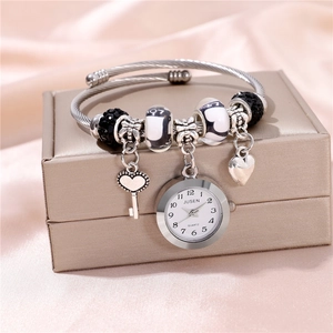 Silver beaded bracelet watch with heart key pendant and black crystals on jewelry box