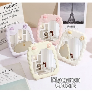 Collage of wavy macaron desk mirrors in pink, purple, white and yellow pastel colors