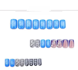 Detail of 3D ocean blue water ripple nails with silver metallic stripes and star pendants