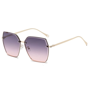 Chic oversized rimless sunglasses featuring gradient purple pink lenses and gold metal frames