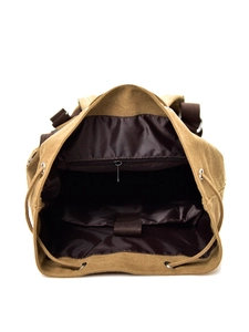 Spacious khaki canvas backpack with interior compartments and brown lining for travel