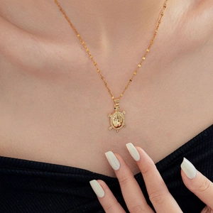 Elegant gold turtle necklace for women featuring sparkling cubic zirconia pave setting