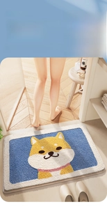 Close-up of thick flocked bathroom mat with cute Shiba Inu design and absorb water text