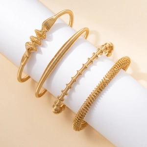 Four-piece set of gold titanium steel twisted and beaded spiral bangles for women