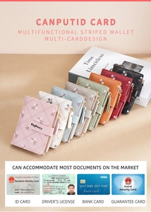 Detailed stack of multi-colored floral PU leather card holders on a minimalist desk