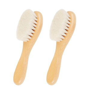 Natural wool baby hair brush set with soft white bristles and wooden handles