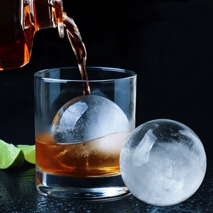 Spherical ice ball mold for whiskey with crystal clear round ice spheres for chilling