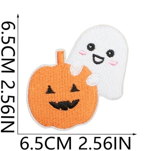 Detail of Halloween ghost and pumpkin embroidery patch with 6.5cm size measurement
