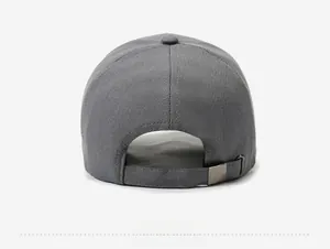 Detail view of the adjustable metal buckle on dark gray cotton baseball cap for men