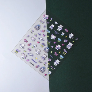 Detailed view of 3D embossed cute bear nail art stickers with purple tulip designs