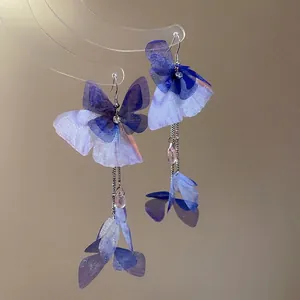 Blue and purple mesh butterfly wing earrings with long tassels and crystal teardrop drops