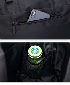 Detail of nylon messenger bag showing a zipper pocket for phone and mesh drink holder