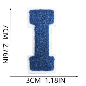 Detail view of royal blue chenille letter I patch measuring 7cm with white border