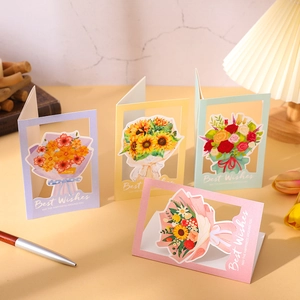 Set of four hollow floral 3D pop-up greeting cards in soft pastel colors for teachers