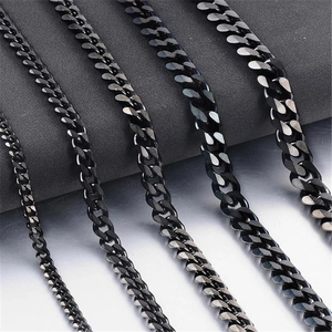 Detail view of black titanium steel Cuban chains in various thickness with metallic finish
