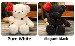 Detail of curly plush teddy bear set in white and black holding red heart balloons