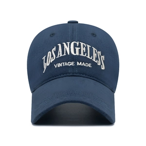 Navy blue baseball cap with white Los Angeles embroidery on a classic cotton twill crown