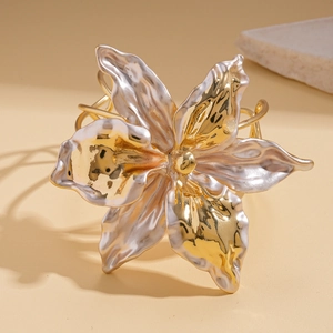 Artistic gold and silver metallic flower open bangle with textured petal design