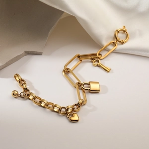 18K gold plated titanium steel chain bracelet with heart, lock, and key charms for women