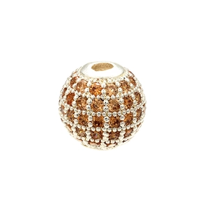 Close-up of a silver spherical bead pavé-set with sparkling brown zircon gemstones
