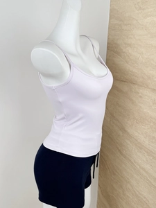 Close-up of slim lavender tank top with U-neck design on a female mannequin model