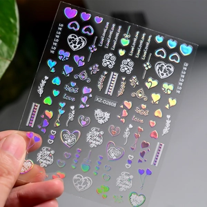 Holographic heart nail decals with Love You Forever text and floral patterns