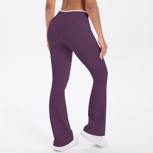 Rear view of high-waist purple yoga flare pants with white contrast waistband trim