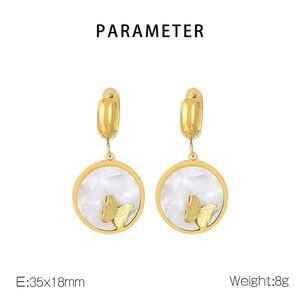 Detail view of gold butterfly shell earrings with size 35x18mm and weight 8g specs