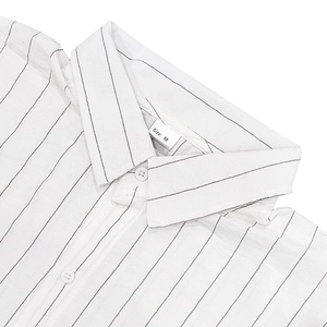 Close-up of white vertical striped shirt collar with detailed fabric texture and size tag