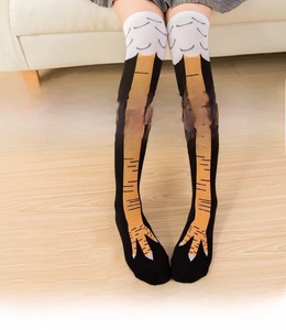 Over-the-knee socks featuring creative chicken feet print with realistic yellow leg patterns